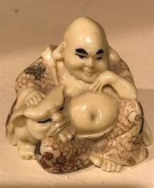 Netsuke style Buddha