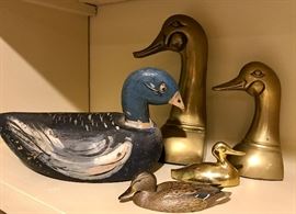 One of these little guys is vintage from Abercrombie, signed Val Bennett 1981 on the bottom.