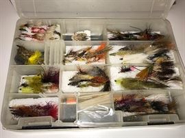 Lots of flies for fly fishing and materials to make flies.