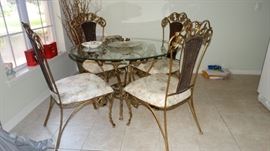 OUTSTANDING WROUGHT IRON BASE GLASS TOP TABLE & CHAIRS. GRAPE & GRAPE VINE DETAIL, GILT HIGHLIGHTS.