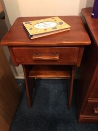 Nightstand has a matching desk, stool, Chest of drawers and bed