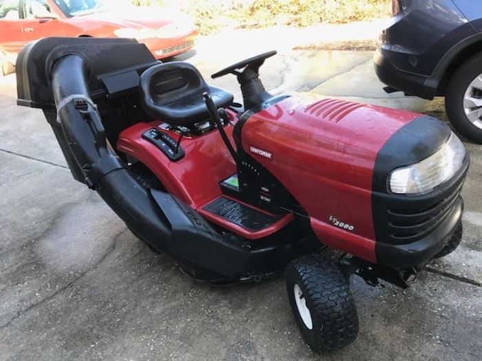 Craftsman LT2000 lawn tractor.  Also has a leaf rake/vacuum  - sure could have used THAT in the last couple weeks!