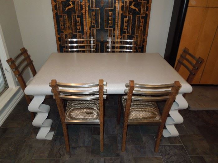 Custom Dining Table: 66"l x 41"w x 29"h               
Six Heltzer Wenge & Brushed Stainless Steel Side Chairs:  36" h x 18" x 17 1/2"
