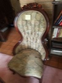 tufted chair with beautiful wooden frame