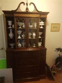 China Cabinet filled with antique and vintage milk glass