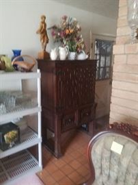 Asian wooden cabinet with plenty of drawers and doors