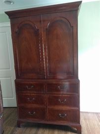 Nicely detailed mahogany entertainment armoire, with doors that open and slide in; measures 3' W x 6' 5" T x 17" D.