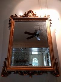 Large gilt mirror, with beveled glass, Diamond View, by Sterling Industries; measures 3' 10" x 2' 7".