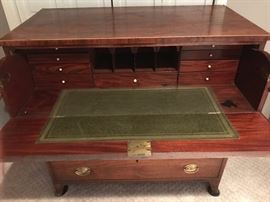 Here's the church, and here's the steeple
Open the door and see all the people.                            Oh wait, that's something entirely different.              Open the top drawer of this chest and it instantly becomes a secretary that won't talk back!