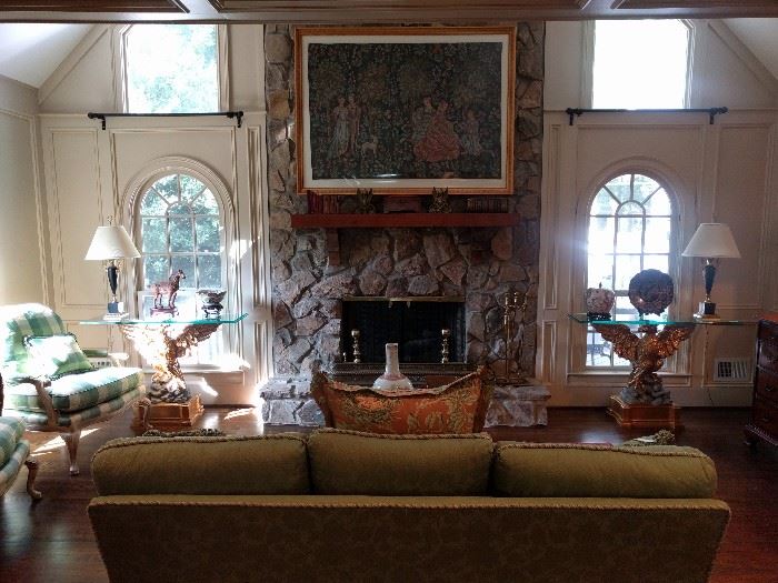 View of the great room. The stone fireplace is flanked pair of UNBELIEVABLE  gilt wood Italian console tables, with very thick, beveled glass, L-R facing. You won't often see a pair of this quality. The original cost of each eagle, without the glass tops was $2K.                              I knoooooow!