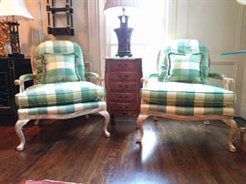 Beautiful pair of silk plaid, balloon-backed bergere chairs, by Wesley Hall (Hickory, NC). Vintage French, marble-topped chest, with five drawers between the chairs, topped with an oxblood Asian lamp.