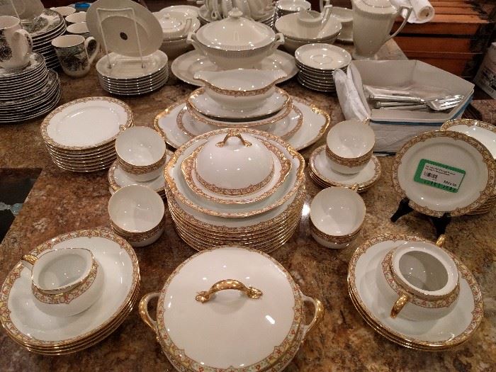 Vintage 64-piece set of Vignaud Limoges (France) china.