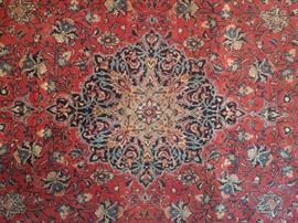 Center medallion of the room size Persian Lilihan Sarouk.