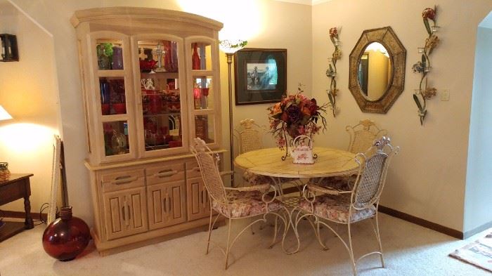 china cabinet and table with chair