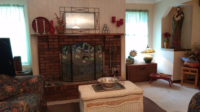 wicker trunk and fireplace screen