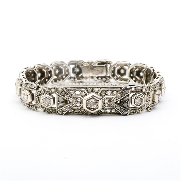 Edwardian Platinum and 3.00 CTW Diamond Link Bracelet: An antique Edwardian platinum link bracelet with 4.27 ctw of old mine cut and rose cut diamonds and milgrain detailing throughout.