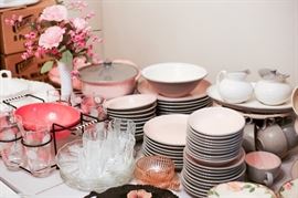 Service for 12 - light pink on top, gray on bottom.  Dishwasher and microwave safe.