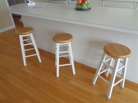 Many counter-height stools