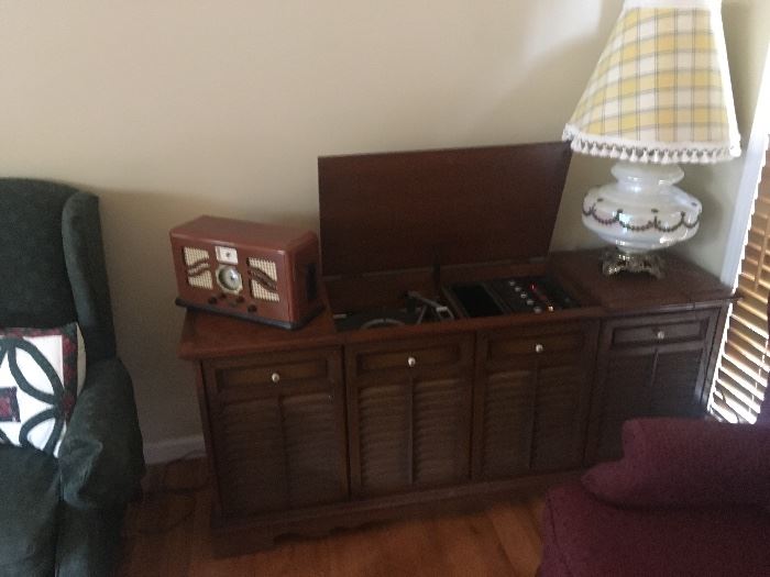 Record player and radio many records works and looks great 