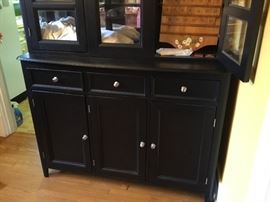 Bottom of black China cabinet