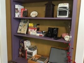 Speakers, small plaques, candle holders, music of all kinds.