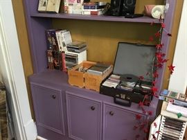 CD's, tapes, small wooden tower for CD's