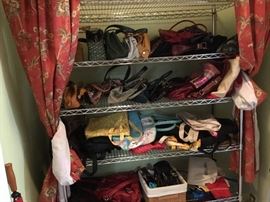 Purses, purses, purses - rack not for sale.