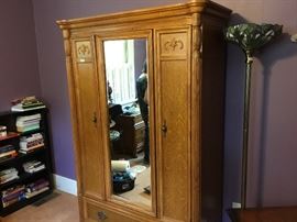 Great mirrored armoire with tons of space.
