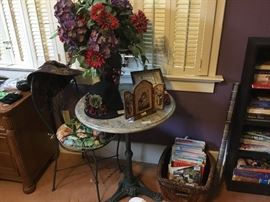 Small table and 2 matching chairs and more home decor.