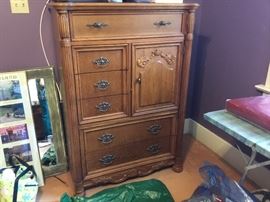 Wonderful 6 drawer chest with one side for folded clothing.