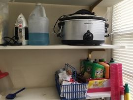 Storage area for laundry, supplies & additional large kitchen items.