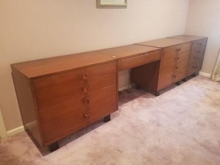 Authentic 1960s Herman Miller bedroom set features three chests, desk, nightstands, small cabinet and queen size bed.