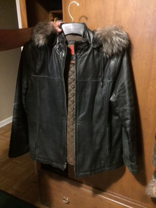 Leather coat with faux fur hood