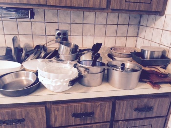 Many pots and pans, milk glass, baking dishes