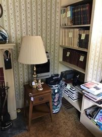 On shelves of bookcase are sets of C. 1940's & 50's children's encyclopedias and American Heritage publications.  Nice maple, one drawer stand with splay legs.  Brass lamp. newer rugs.