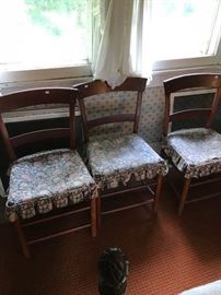 Three of four matching cherry chairs from Pennsylvannia House.  Seats need replacing.