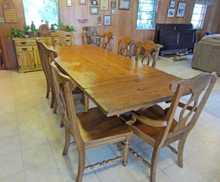 Large end leaf farm table with eight very sturdy chairs 