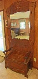 Antique hall tree with seat