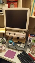 Telesensory Aladdin Sunshine low vision magnifier. The unit features a CRT monitor and is an ideal way to magnify anything small on a large screen