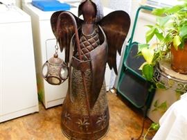 four ft angel with lantern hanging from a staff