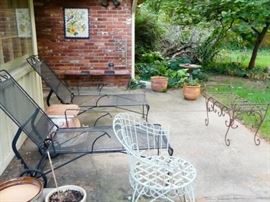 Patio furniture with pads in garage.