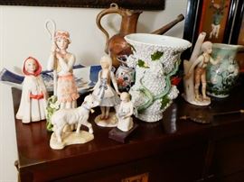 Meissen vase with overall flower blossom decorating amidst which full relief bird is perched on a tree branch that winds around the base  Gereman c. 1850. Other porcelain pieces and vases 