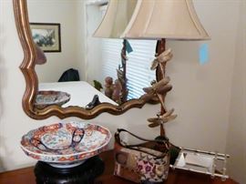 a Dragonfly lamp with shade and mirror 