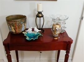 unique table that opens up and twists into a card table size 