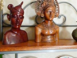 busts of indian man and woman.