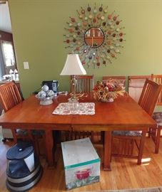 beautiful dining room table with 2 leaves and 8 chairs!  DINING ROOM