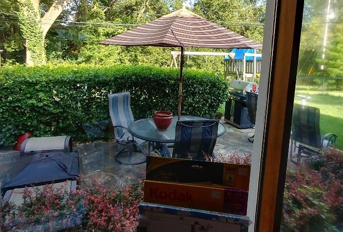 patio set, firepit, grill, and more out back!     BACKYARD