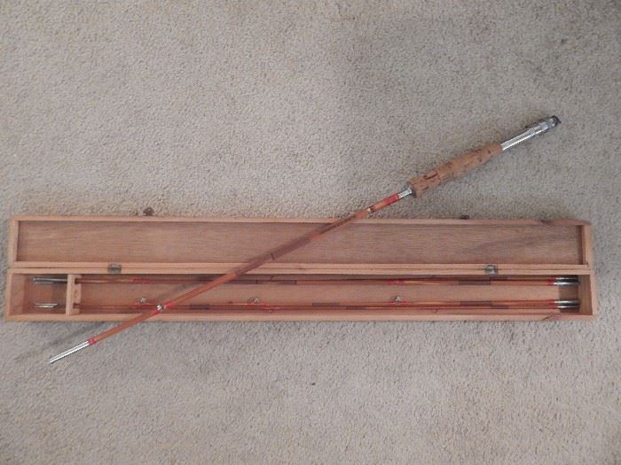 Vintage Fishing rod with multiple ends and storage box