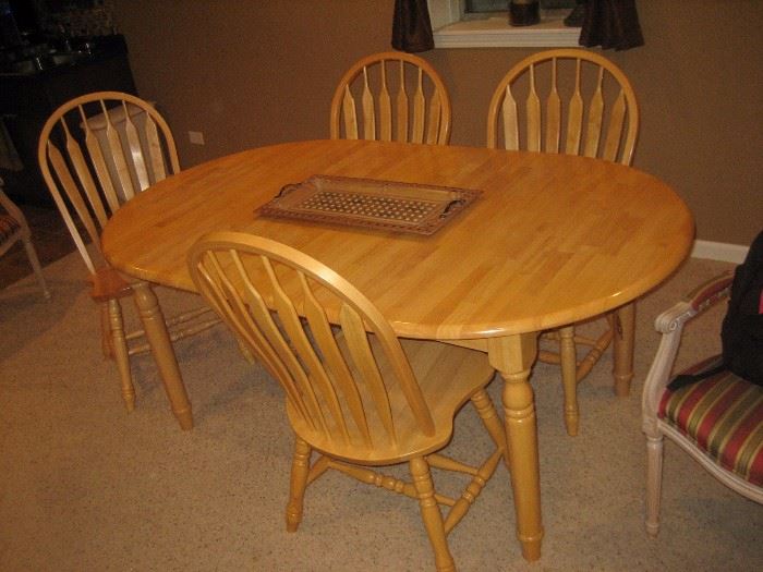 Table and 4 chairs, shown with leave inserted.$225