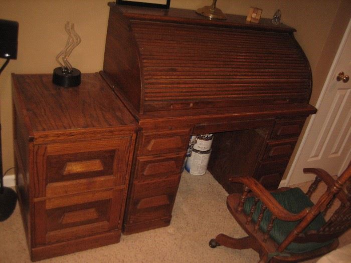 Roll top desk and file desk. Desk is in good shape, top works great $135. Filing cabinet $40